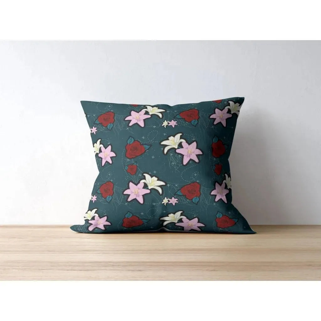 Square throw pillow mockup displaying a repeating dark floral and skull pattern, perfect for gothic or vintage surface design.