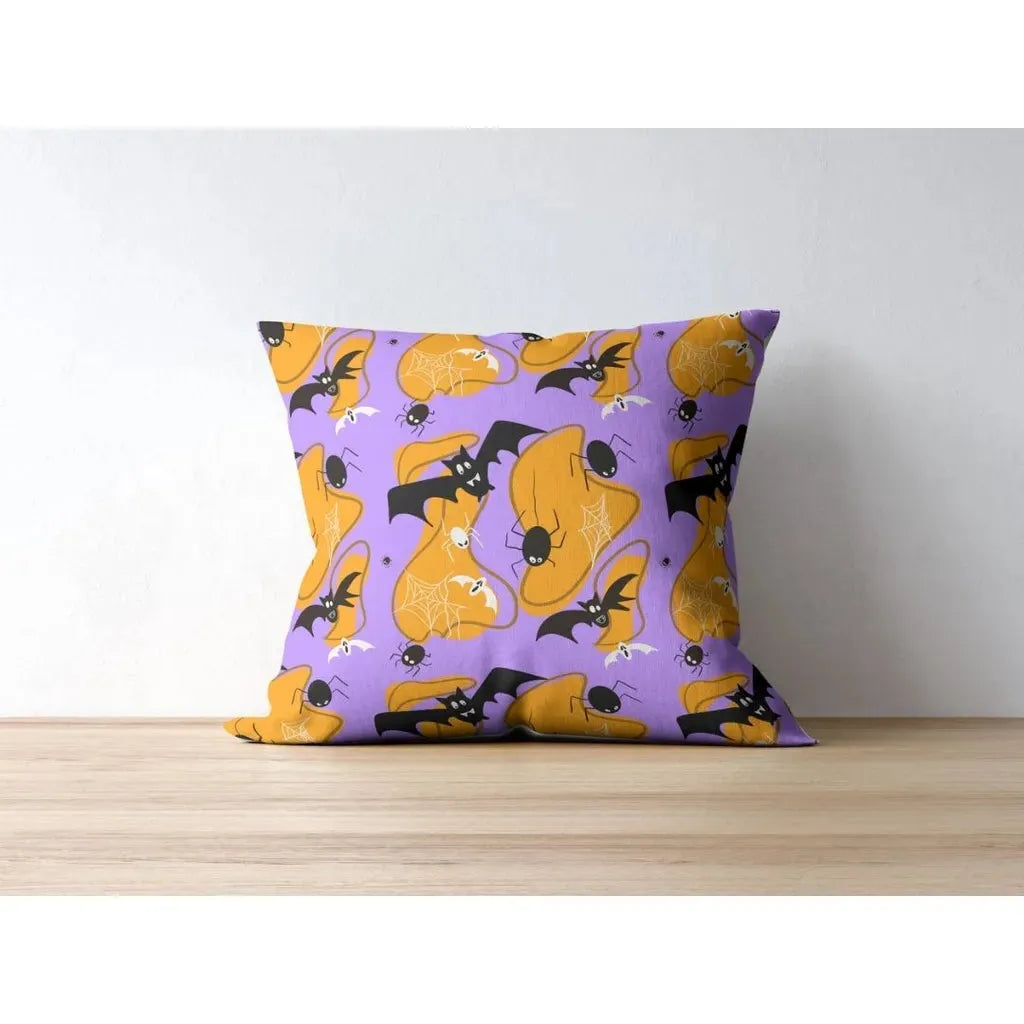 Close-up mockup of a single throw pillow showcasing the repeating wonky bats seamless pattern on fabric for spooky decor.