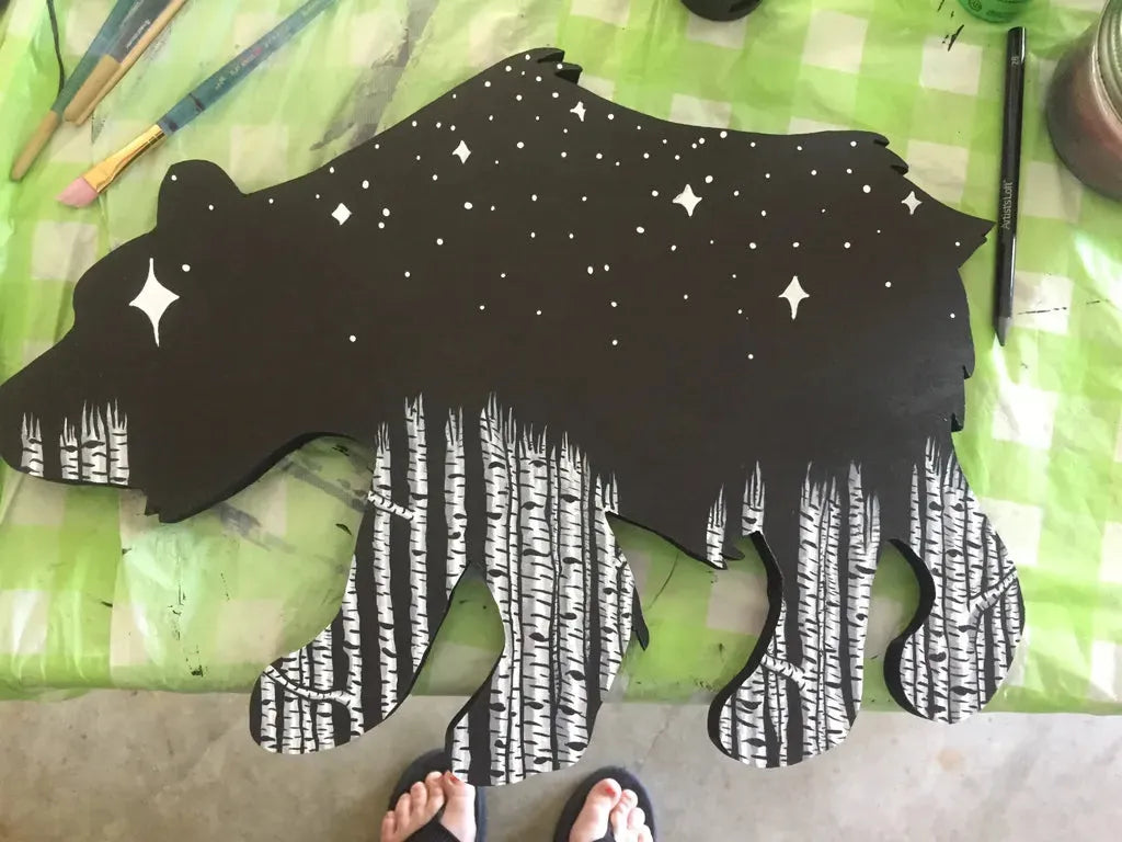 Starry Bear Wood Cutout: Custom acrylic painted bear silhouette on wood, featuring a birch forest and starry night inlay pattern.
