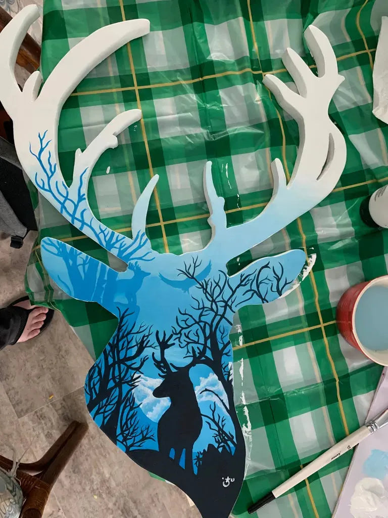 Custom Wood Silhouette Deer Head Art: Layered blue painted deer on a rustic wood background. Unique nature commission.