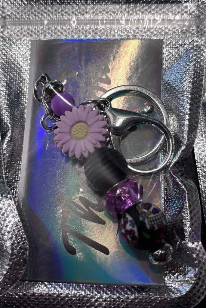 Handmade purple flower beaded keychain, personalized and stylish, by Whoops Creations.
