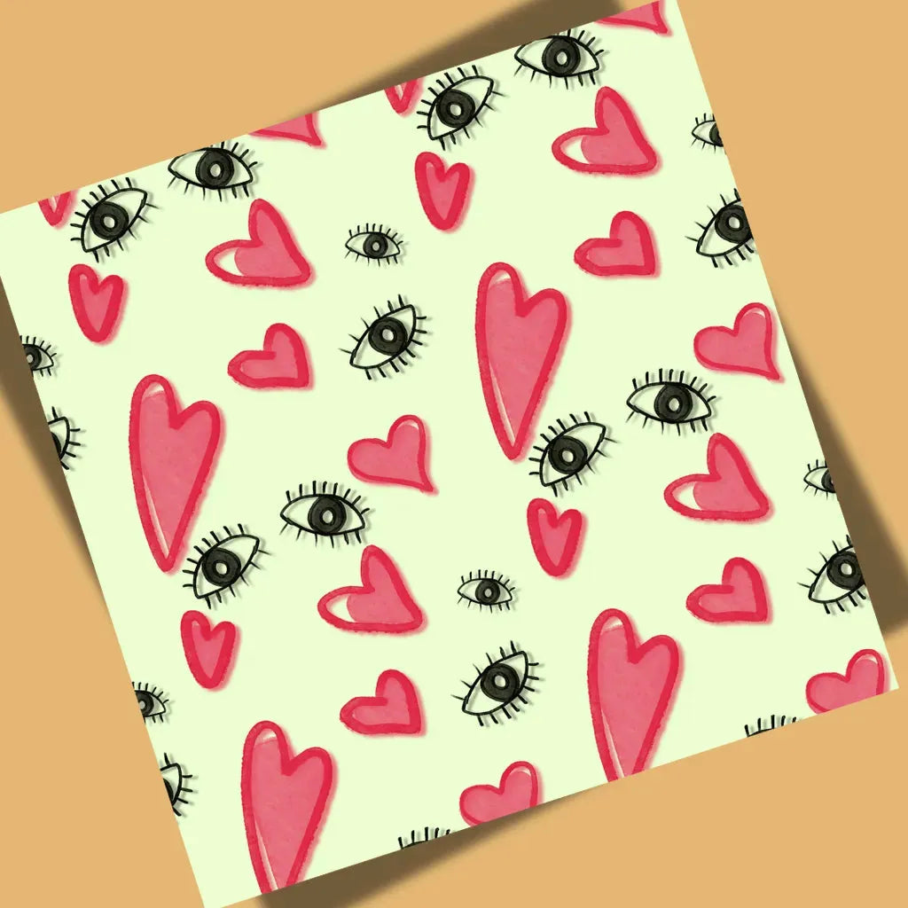 Full tile view of the hand-drawn eyes and hearts seamless pattern on a light green background.